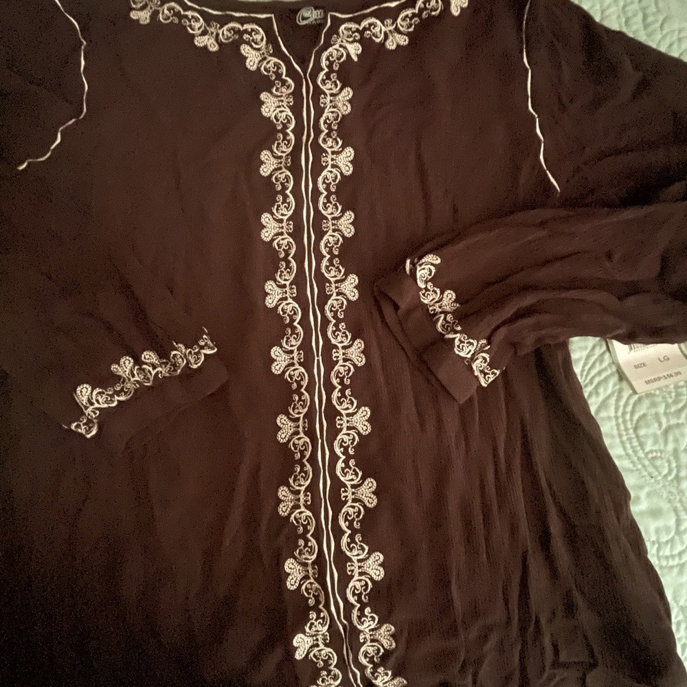 Cowgirl Tuff Rich Dark Brown top with ivory color. Kind of a “crepe” material
